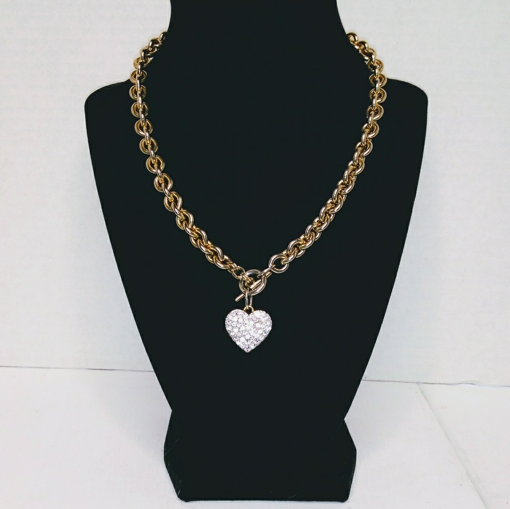 Gold tone heavy chain link with crystal heart pend